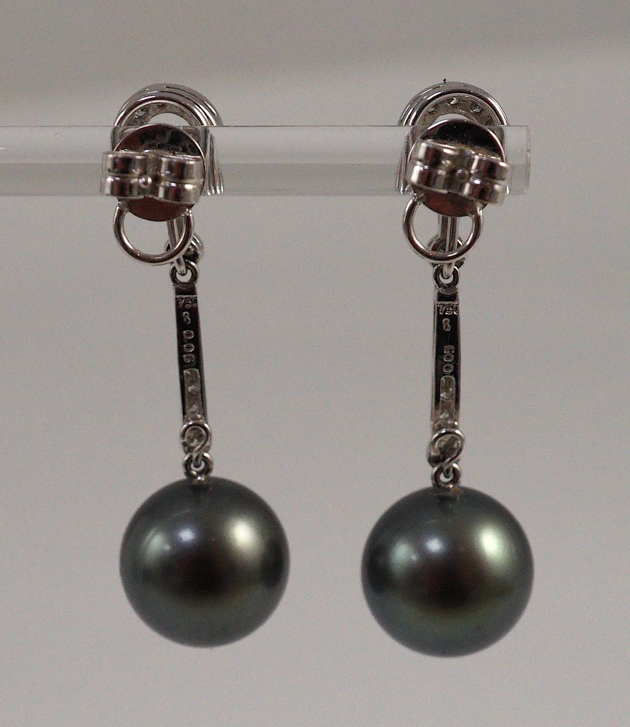 A modern pair of single stone South Sea Tahitian pearl style and diamond chip set drop earrings
